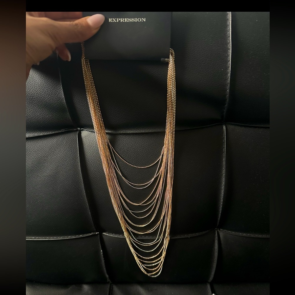 SOLD! Multi-Layer Gold and Silver Necklace, a perfect blend of elegance.